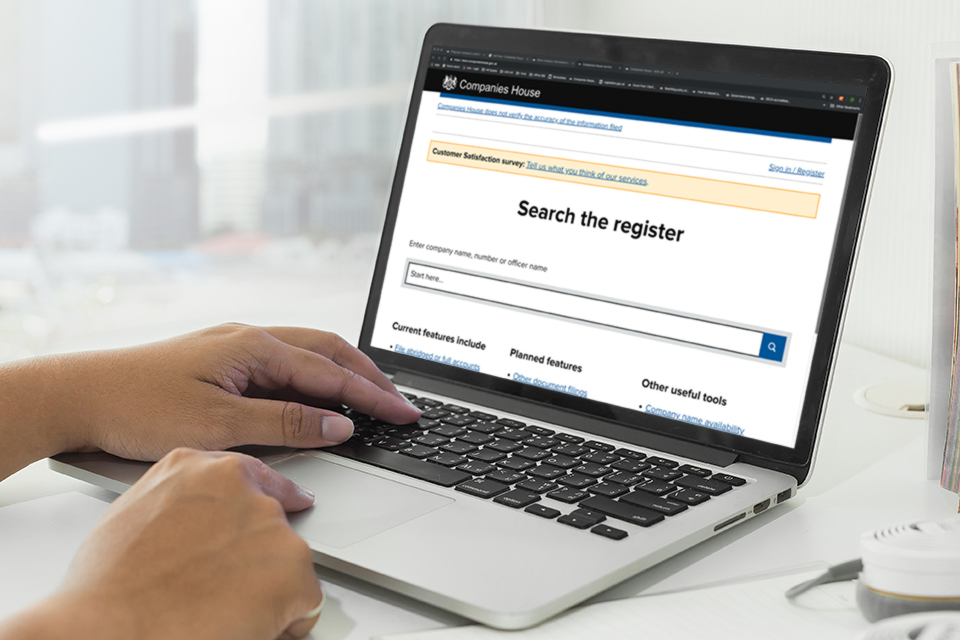Companies House online register displayed on a laptop