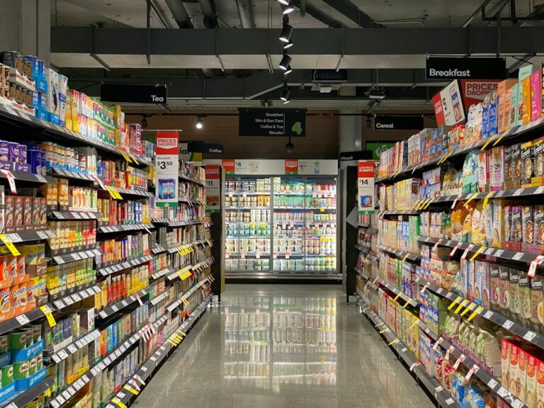 Shelves of groceries in a supermarket food aisle