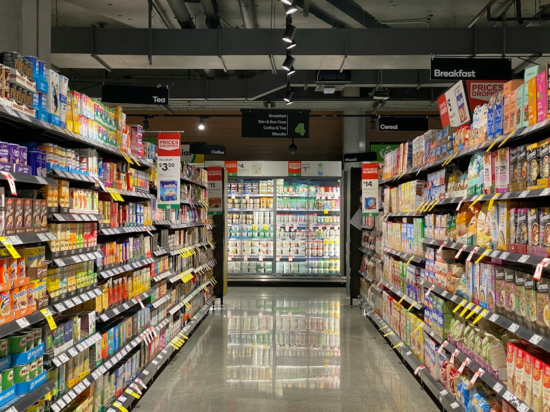 Shelves of groceries in a supermarket food aisle