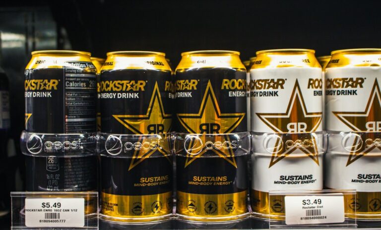 Energy drink cans displayed on a retail shelf