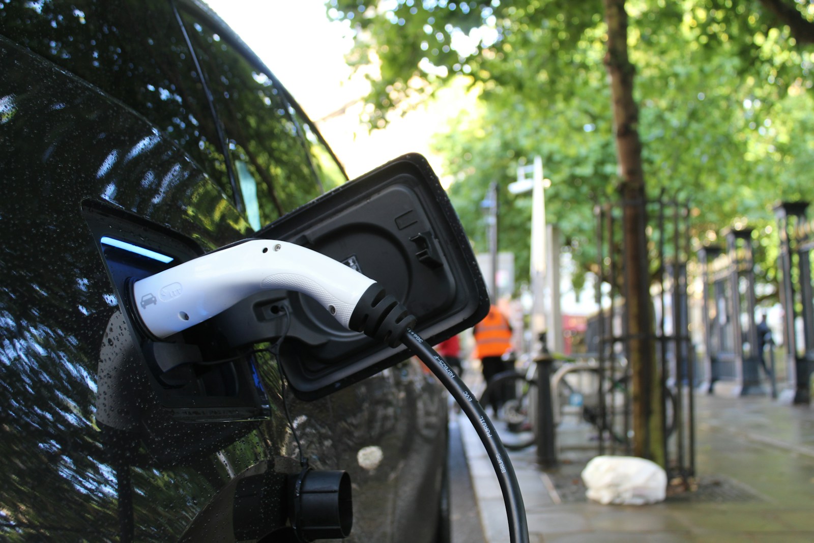 Electric Car Connected to a Public Charging Point in the Uk